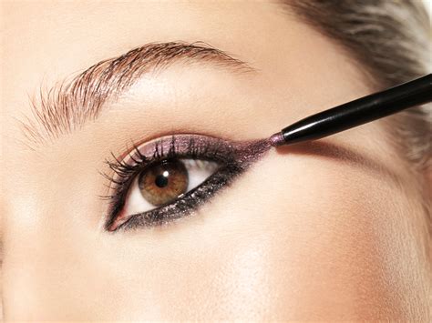 Eyeliner for brown eyes. Nov 15, 2023 · Use the soft brown eyeshadow with pink undertones as an eye primer. Apply the violet eyeshadow all over the eyelid and blend. Apply black to the outer corner and the lower lash line to create a smokey effect. Finish with eyeliner and fake lashes for a dramatic effect. 