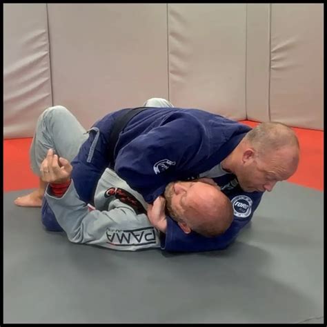 Ezekiel choke. You won't get it in traditional posture sitting on your ass like how most whitebelts do it. You have to get up and smash your opponent's hips forward to get in a good angle for the choke (think double under pass but with your legs instead of your arms). Ezequiel Paraguassu himself used it in this way to great effect. 