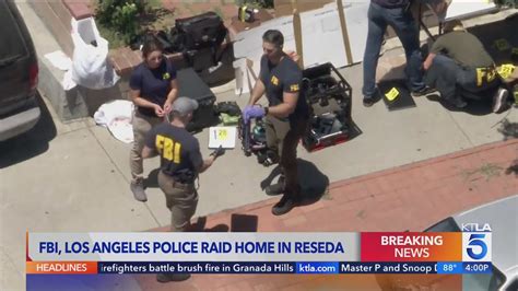 FBI, Los Angeles police raid home in Reseda