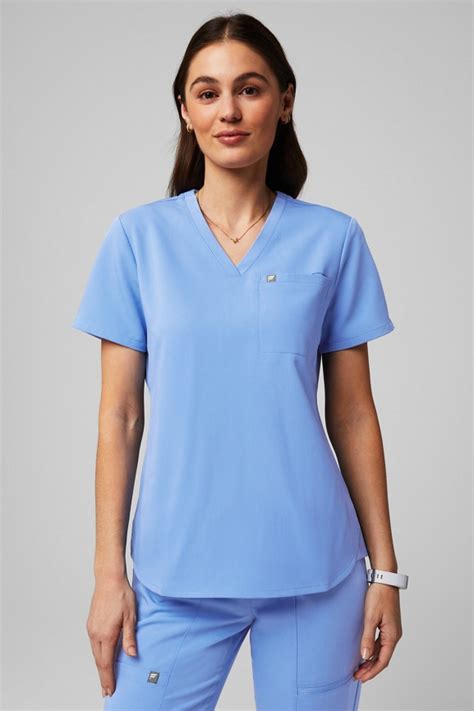 Fabletics Scrubs Vs Figs, Fabletics Scrubs launches with the brand's  first-ever Scrubs line created specifically for the medical community.
