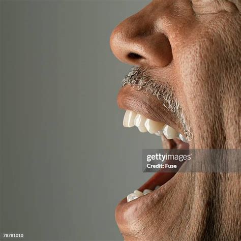 Face Side Open Mouth Stock-Fotos und Bilder - Getty Images