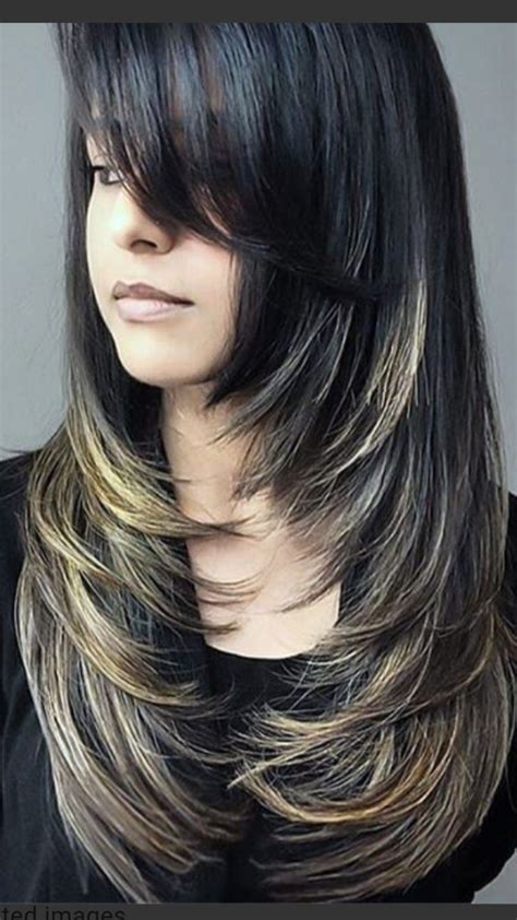 Here is our top list of layered hairstyles for older women: Shoulder Length with Long Side Swept Bangs – Volume and flirty long bangs. Short Face Contouring Layers – Layers can be cut into shorter hair. Wispy Layers with Curtain Bangs – Curtain bangs look great on everyone. Wavy Textured Layers – Great beach hair look.. Face framing layers long straight hair