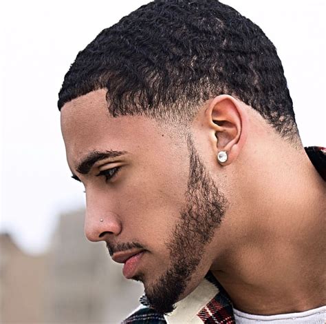 The main difference between a skin fade and a regular fade is the length of hair at the sides and back of the head. In a regular fade, the hair gradually fades from longer on top to shorter on the sides and back, but it typically doesn't go all the way down to the skin. On the other hand, a skin fade is cut down to the skin, gradually fading .... 