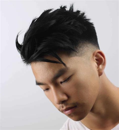 This creates a dramatic and fun appearance which you are sure to love. 2. Choppy Bowl Haircut. Bowl haircut is one of the most popular haircuts for Asian boys as it is easy to cut and even easier to style daily. This one is a fun variation with choppy cuts along the circular length of the hair.. Fade haircuts asian