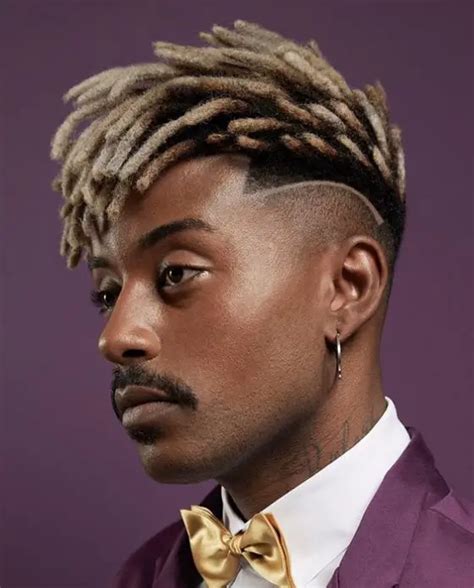 14. Mohawk Dreads for Men. if you’re looking for a classic high top fade with dreads then this is the one for you. To get this hairstyle your hair should first be braided back and THEN turned into braids, style them into a low bun. Make sure your edges are braided as well with the rest of your hair.
