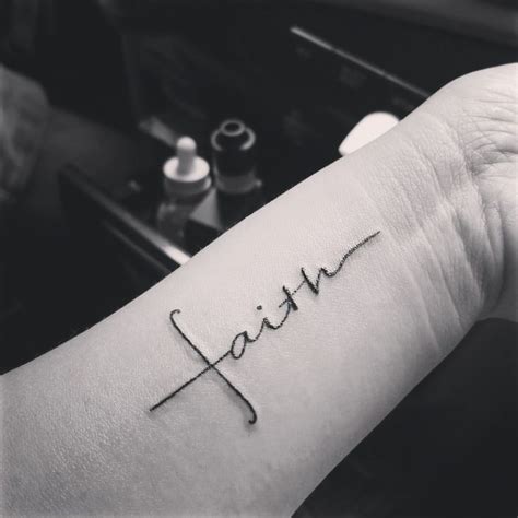 Faith cursive tattoo. Ephesians 2:8. “For it is by grace you have been saved, through faith—and this is not from yourselves, it is the gift of God”. This Bible verse is a great inspiration for anyone who wants to get a tattoo acknowledging the role of grace and gratitude in life. 