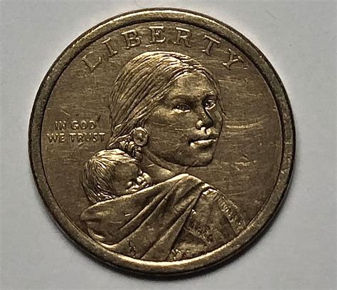 Rassi #GoCubs #FlyTheW #WeAreGood. Knowble said: ↑. I have three of these undated Sacagawea coins, nothing on the edge, and the reverse sides are different, too. One side has trees getting planted, the other says 1621 Wampanoag Treaty, the other says 'Great Law of Peace' with six arrows. Most likely the date/mint mark just wore off.. 