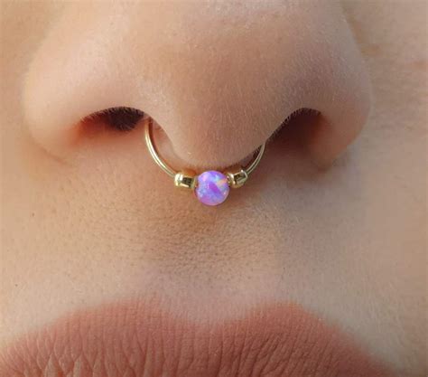 Fake septum piercing. D.Bella Fake Septum Fake Nose Ring Hoop 20G Faux Nose Piercing Hoop Clip on Nose Rings Non Piercing Fake Nose Septum Lip Ear Ring Faux Body Piercing Jewelry for Women Men 4.2 out of 5 stars 381 1 offer from $11.99 