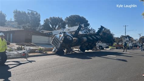 Falling crane crushes family's home in California