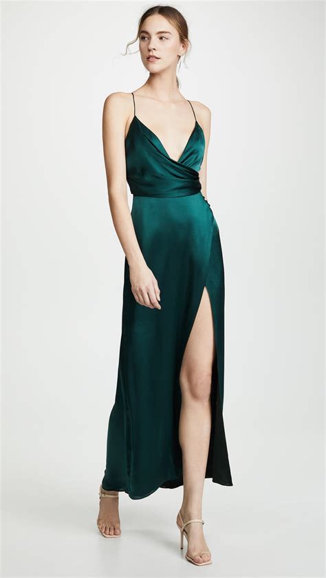 Fame and partners dress. Product Description. A silky satin dress from Fame and Partners, at once timeless and unique with a subtle cowl neckline and an empire-waist design. A deep front slit relaxes … 