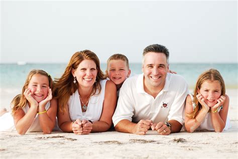 Family beach photo. Family Photography on Folly Beach, SC | Fun, Laid-Back, & Affordable! 