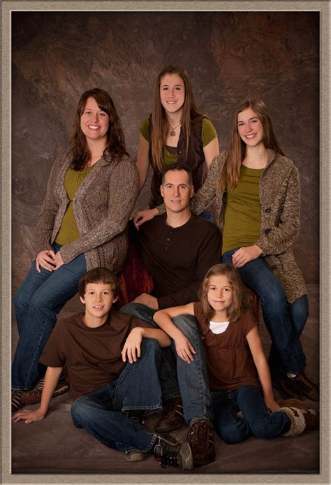 Family portrait studio. Fourty (40) people comfortably posed for a family grouping in the studio. Specialists in large family groups. A family of 7 siblings, brothers and sisters beautifully posed in … 
