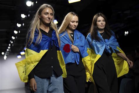 Far from home, Ukrainian designers showcase fashion created amid air raid sirens