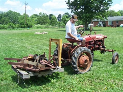 Implements may be specific to one or two of these or may be common to all three. Beware that some implements for a Cub look like the ones for a 130 but are smaller and do not mix. ... Here is a picture of our Farmall 140 with 1 point fast hitch with a IH Model 194 one point fast hitch one bottom plow with the rolling coulter.. 