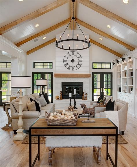 Farmhouse vaulted ceiling living room. Apr 8, 2023 · 4. Add Unique Style to Your Home with High Ceilings. Photo: Credit. A taller and pointed ceiling draws the attention straight up. This is a great option for making two rooms out of a living room with vaulted ceiling. The exposed kitchen helps draw the eye down the length of the room. 5. 