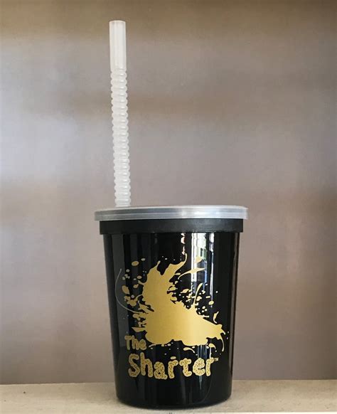 A drinking cup with a straw. Depicted on many platforms as a disposable cup with a lid and bendy straw, as used to serve soft drinks at fast-food restaurants. May be used for a range of non-alcoholic beverages, including milkshakes, smoothies, juice, and to-go beverages. Color and design vary by platform.. 