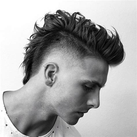 Marine Mohawk. Marine Mohawk is a bold, edgy take on traditional marine haircuts for men. It combines the military precision of a close-cropped cut with the rebellious spirit of a mohawk.. The sides are shaved, leaving a …. 