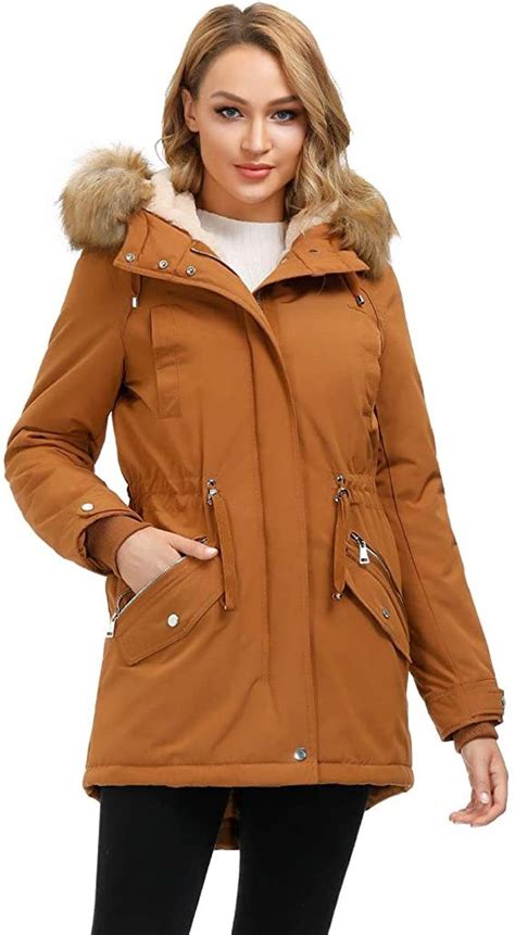 Fashionable winter jackets. Mango oversized longline trench coat in beige. £99.99. ASOS DESIGN strong shoulder trench coat in mushroom. £75.00. New look cropped suedette trench coat in stone. £46.99. Cotton On button up mother puffer jacket with removable hood in black. £45.00. The North Face Saikuru puffer jacket in black. 