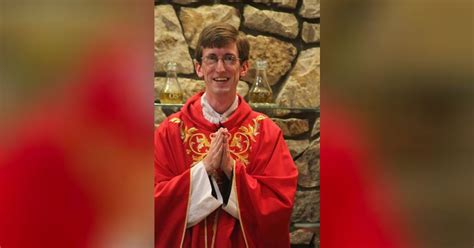 Father Codd installed as pastor at St. Thomas Aquinas Parish