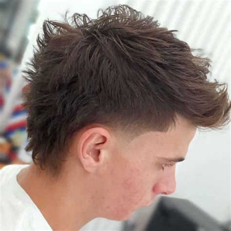 3. Asymmetrical Mullet Fade: For a more edgy, daring look, try an asymmetrical mullet fade with longer hair on one side of the back and shorter on the other side. 4. Mohawk Mullet Fade: This striking style combines a mohawk-inspired center strip of longer hair running from the forehead to the back with faded sides and a flowing mullet in the ...