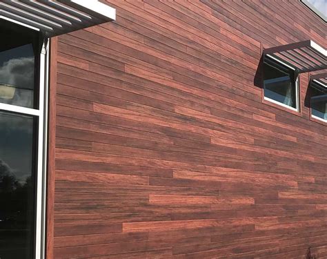 Faux wood siding. Image Series - Forma Steel | Metal Finish mimicking the look of natural materials like wood but with the durability of metal siding. 