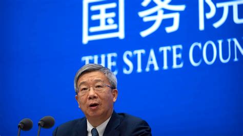 Favoring continuity, China reappoints central bank governor