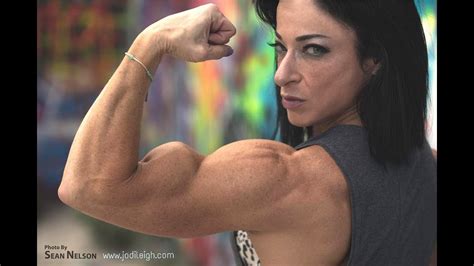 Female Muscle Flex and Kiss Biceps