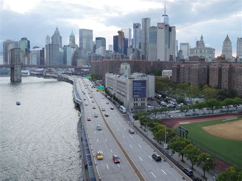 A woman jumped in the East River after her car erupted in flames on the FDR Drive in Manhattan Sunday morning. The unidentified 23-year-old was driving her sedan northbound on the parkway when she .... 