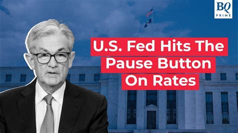 Fed keeps rates steady; Dow Jones hits record high