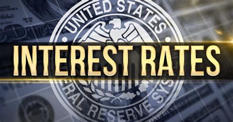 Fed keeps rates unchanged but signals likelihood of another hike this year to fight inflation