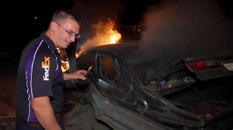 FedEx driver pulls man from burning car after crash in Miramar