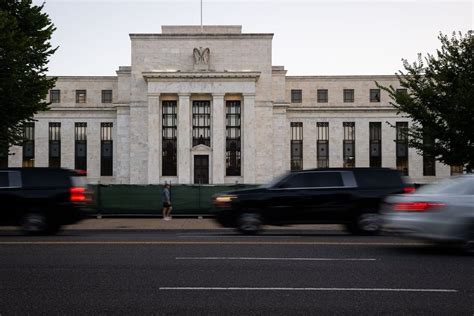 Federal Reserve leaves its key rate unchanged but keeps open possibility of a future hike