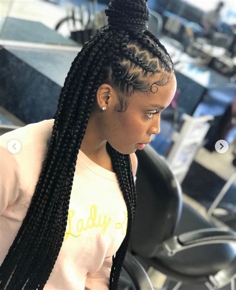 Feed in braids half up half down. Braided Half-up Half-down. Image source @hair_by_tawanna. Alright, so I know this only counts as half an updo — but if there’s a little updo action, we’re counting it! This braided “half-do” is half feed-in braids — extensions of hair you include in your cornrows by simply braiding them into your natural hair — and half Senegalese ... 