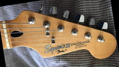 The identification is in the serial number; IC = Indonasia and the first two numbers = the year "03" or "2003". Your Squire Stratocaster is valued at; Mint: $180.00 USD. Exc : $150.00 USD. Exc: $125.00 USD.. 
