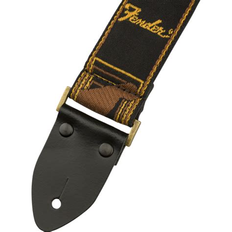 Fender strap monogram.  The strap features a simple pinch-release mechan...
