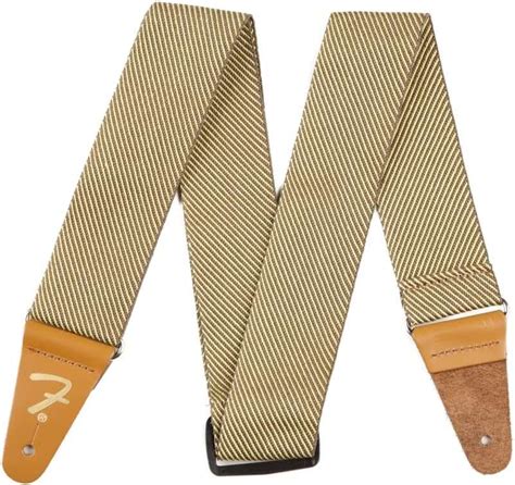 Fender tweed guitar strap.  Fully adjustable length (44”-49.  It plays bea...