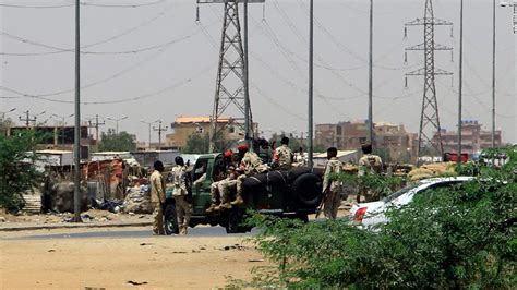 Fighting between Sudan military rivals enters second day, with dozens dead