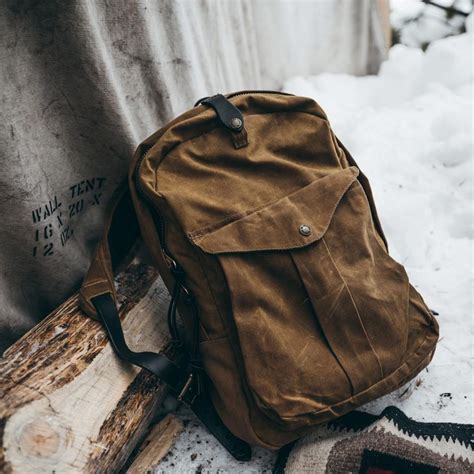 Jan 1, 2020 · Product Description. Item No. 7227452. The Filson Journeyman Backpack is a simple, clean pack for day trips into town and the field. When you just need to carry a few necessities, this bag is your go-to. The padded backpanel makes for comfortable carry and it doesn't overdo it with any extras. The Tin Cloth fabric features an oil finish ... . 