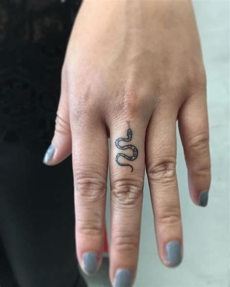 Finger snake tattoo. Things To Know About Finger snake tattoo. 
