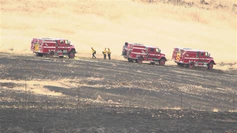 Fire at auto facility south of Fresno 100% contained, officials say