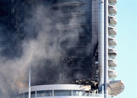 Fire causes black smoke to billow out of Sheraton Hotel