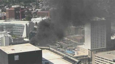 Fire causing black smoke to pour out of Sheraton Hotel