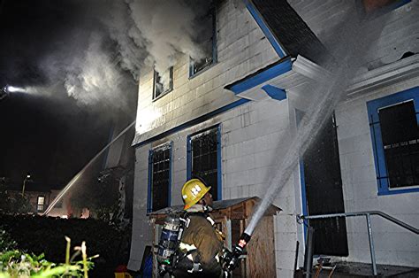 Fire crews battle house fire in Pico-Union