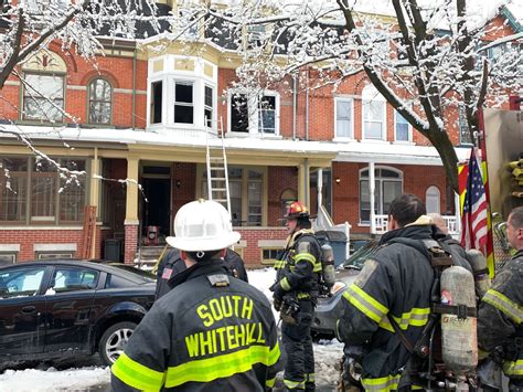 Fire crews battle two-alarm blaze at three-storey home in midtown
