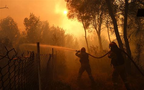 Fire crews lose control of blaze near Athens as southern Europe heat wave keeps communities on alert