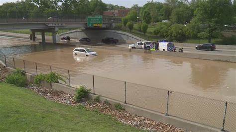Fire crews rescue at least three from SUV stranded in I-64 floods