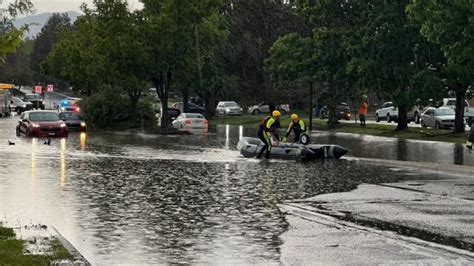 Fire crews rescue driver from flooded road in Arvada