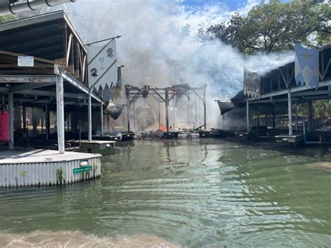 Fire crews respond to boat dock fire in northwest Austin