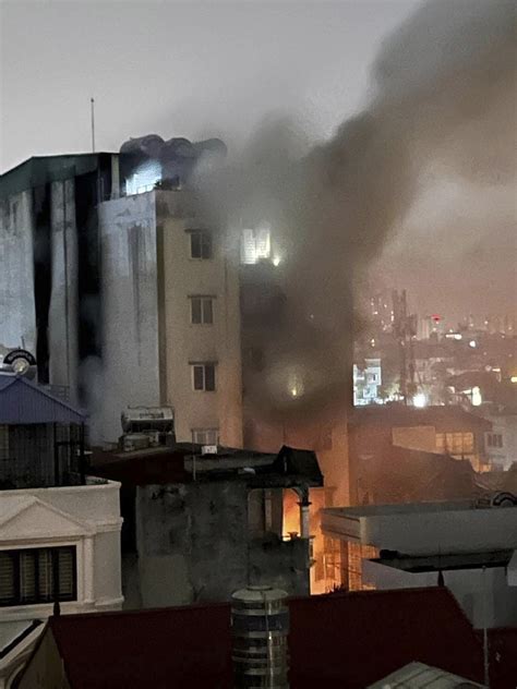 Fire in Vietnam’s capital kills at least 56 when it engulfs an apartment building