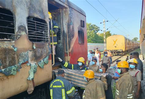 Fire inside a parked train’s private compartment kills nine in southern India